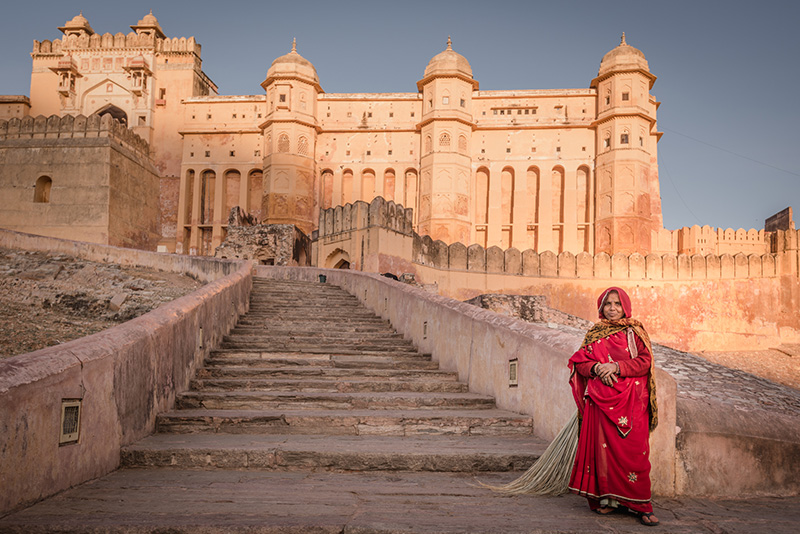 Amer fort worker in red sari