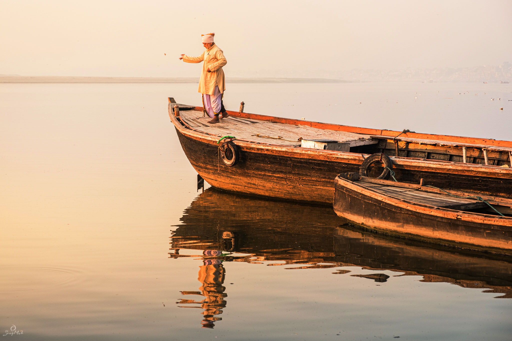 Local feeding fish at sunrise